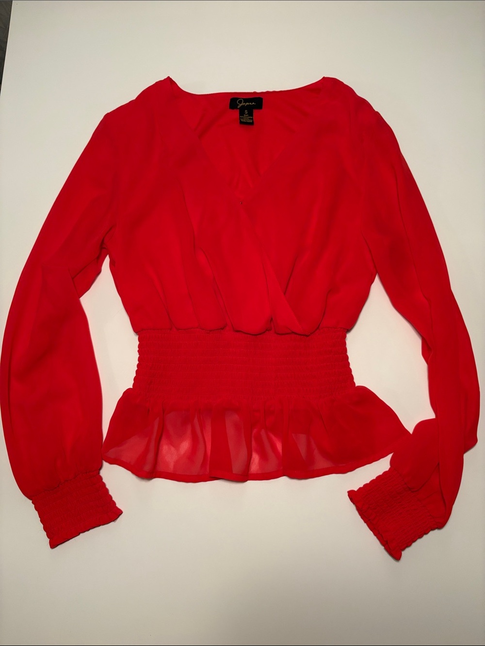 Red Smocked Peplum V-Neck Blouse